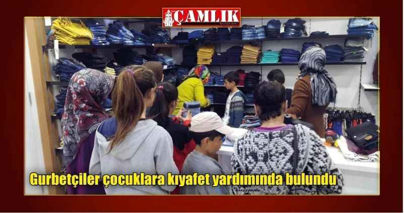 Gurbetçiler çocuklara kıyafet yardımında bulundu