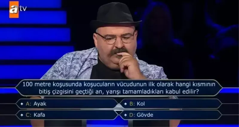 100 metre koşusunda koşucuların vücudunun ilk olarak hangi kısmının bitiş çizgisini geçtiği an, yarışı tamamladıkları kabul edilir?