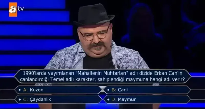 1990'larda yayımlanan "Mahallenin Muhtarları" adlı dizide Erkan Can'ın canlandırdığı Temel adlı karakter, sahiplendiği maymuna hangi adı verir?