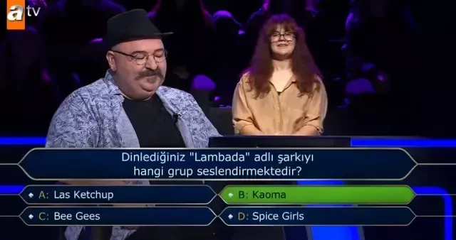 Dinlediğiniz "Lambada" adlı şarkıyı hangi grup seslendirmektedir? Kim Milyoner Olmak İster yeni bölüm soru ve cevapları!