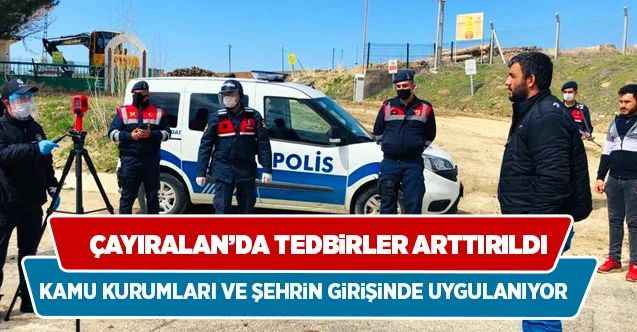 Çayıralan'da Şehre ve kamu binalarına girişlerde ateş ölçerle vatandaşların ateşi ölçülüyor