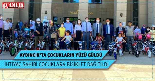 Aydıncık'ta ihtiyaç sahibi çocuklara bisiklet dağıtıldı
